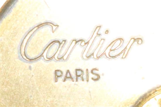 A Cartier of Paris enamelled gilt metal travelling timepiece, 3in.